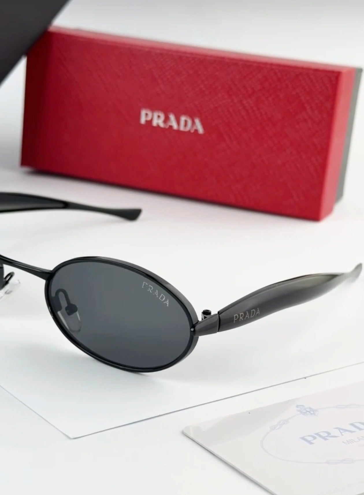 Prada Oval Black Sunglasses