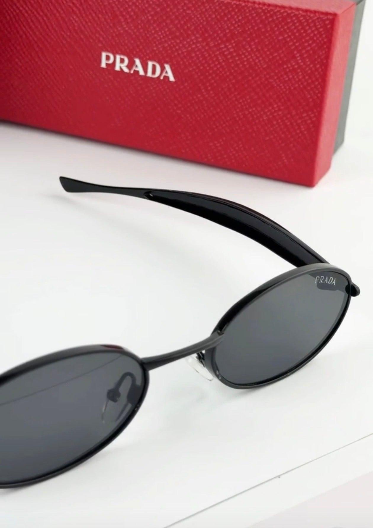 Prada Oval Black Sunglasses